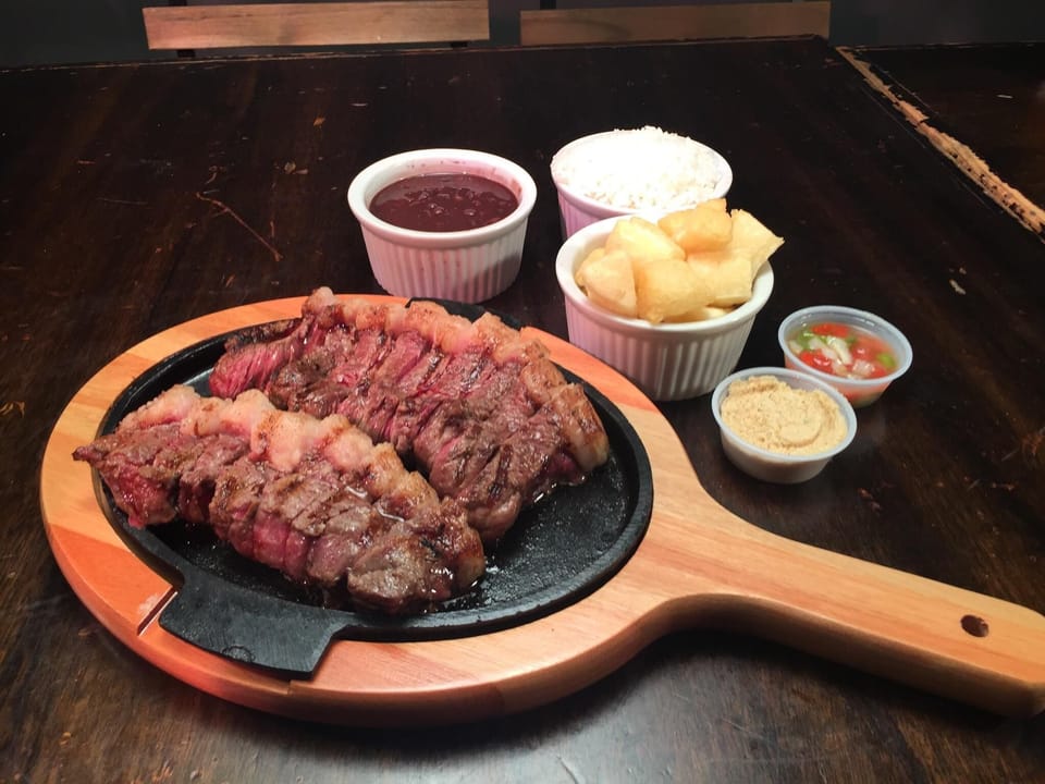 Walk to local Brazilian Dining and Nightlife at “Boteco.”