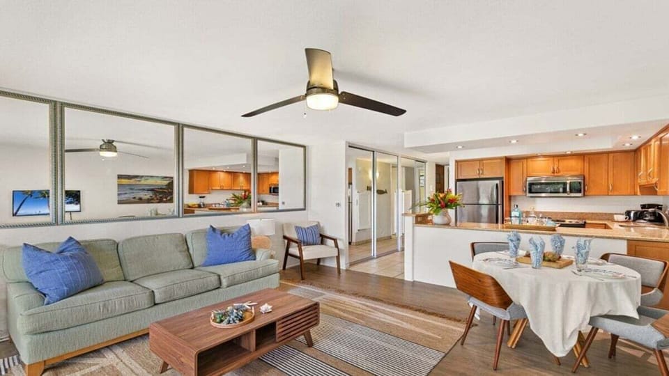 Relax in a bright living room with coastal style.