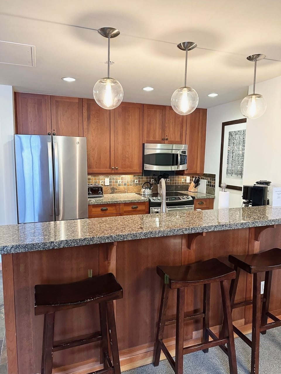 Kitchen with stainless steel appliances and dishwasher