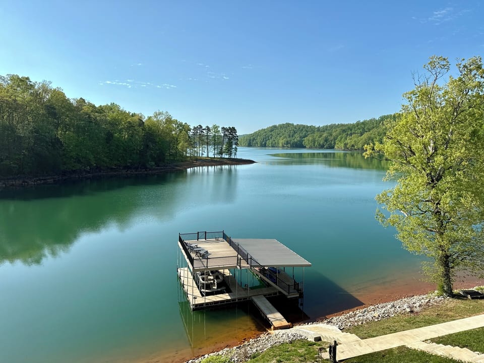 2 slip dock with sun deck and jump gate (you may see previous dock in some pics)