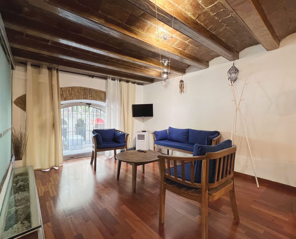 Apartment (2 Bedrooms) | Living area | 65-inch TV with cable channels
