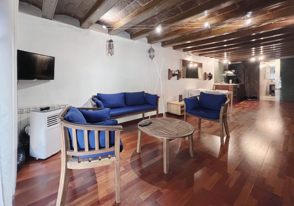 Apartment (2 Bedrooms) | Living area | 65-inch TV with cable channels