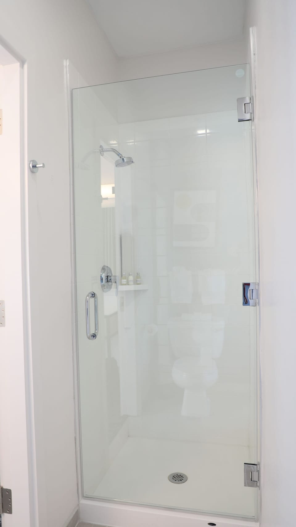 Deluxe Room, 1 Queen Bed (Renovated) | Bathroom | Combined shower/tub, hair dryer, towels