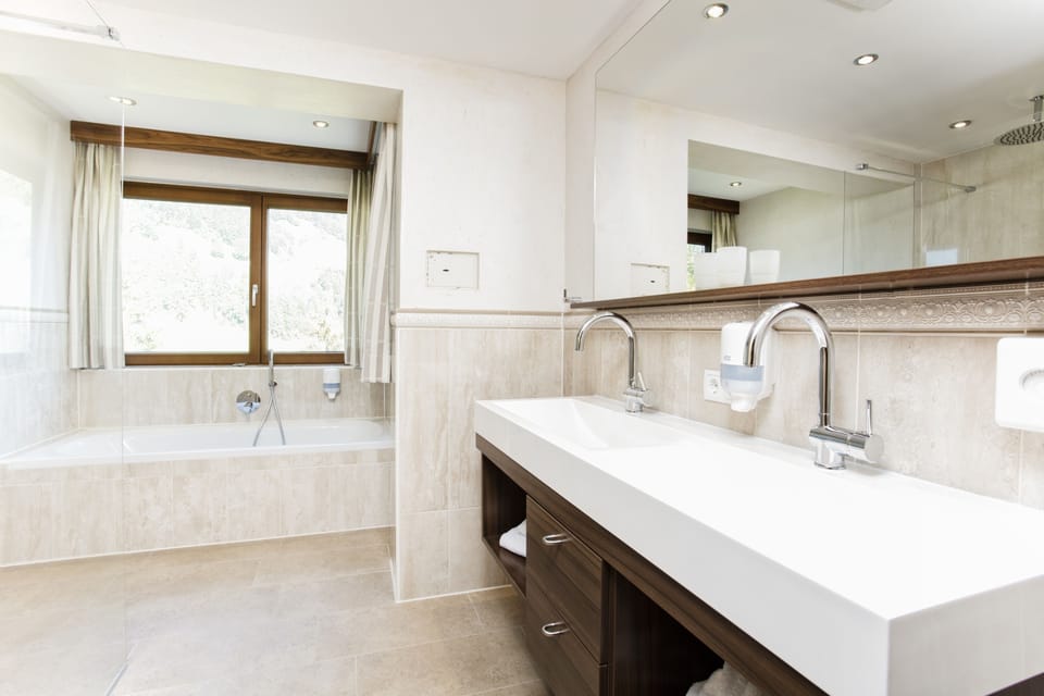 Panoramic Double Room, Balcony, Mountain View | Bathroom | Free toiletries, hair dryer, bathrobes, slippers