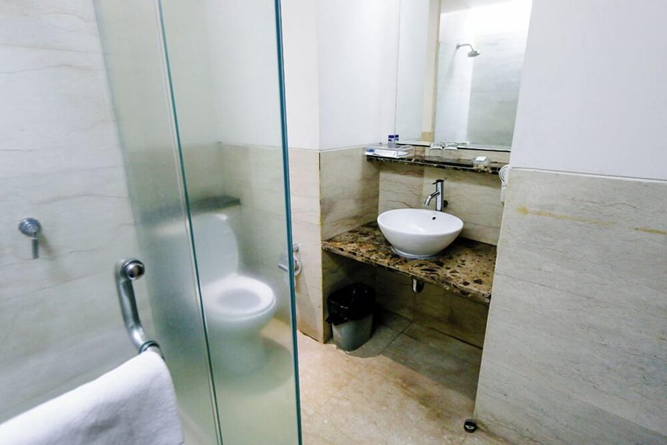 Shower, free toiletries, hair dryer, slippers