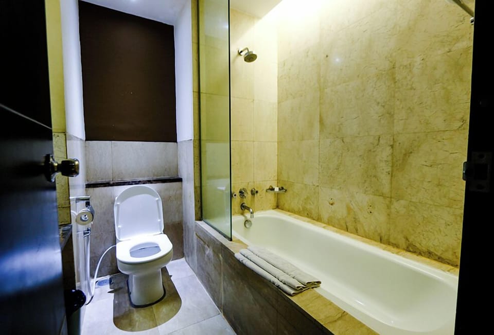 Shower, free toiletries, hair dryer, slippers