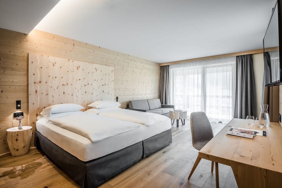 Deluxe Room (Erta) | Down comforters, minibar, in-room safe, individually furnished