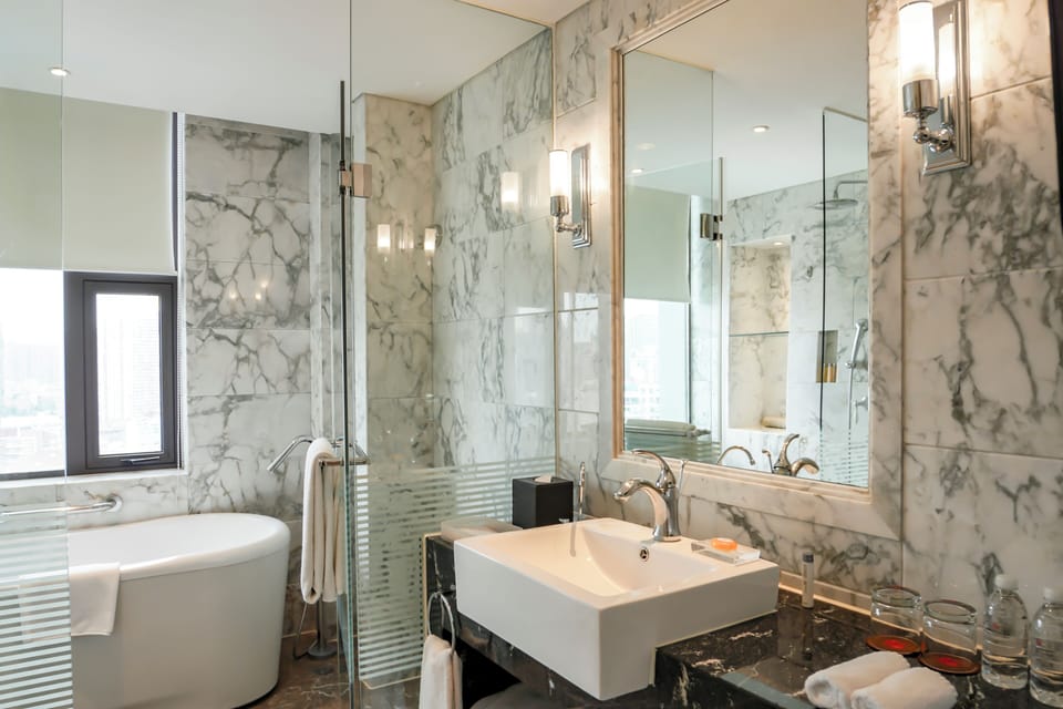 Standard King Room | Bathroom | Separate tub and shower, deep soaking tub, rainfall showerhead