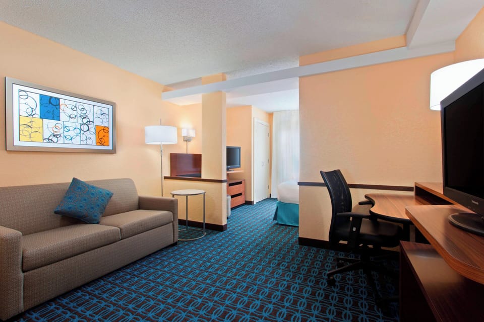 Room, 1 King Bed with Sofa bed | Living area | 32-inch flat-screen TV with cable channels, TV, pay movies