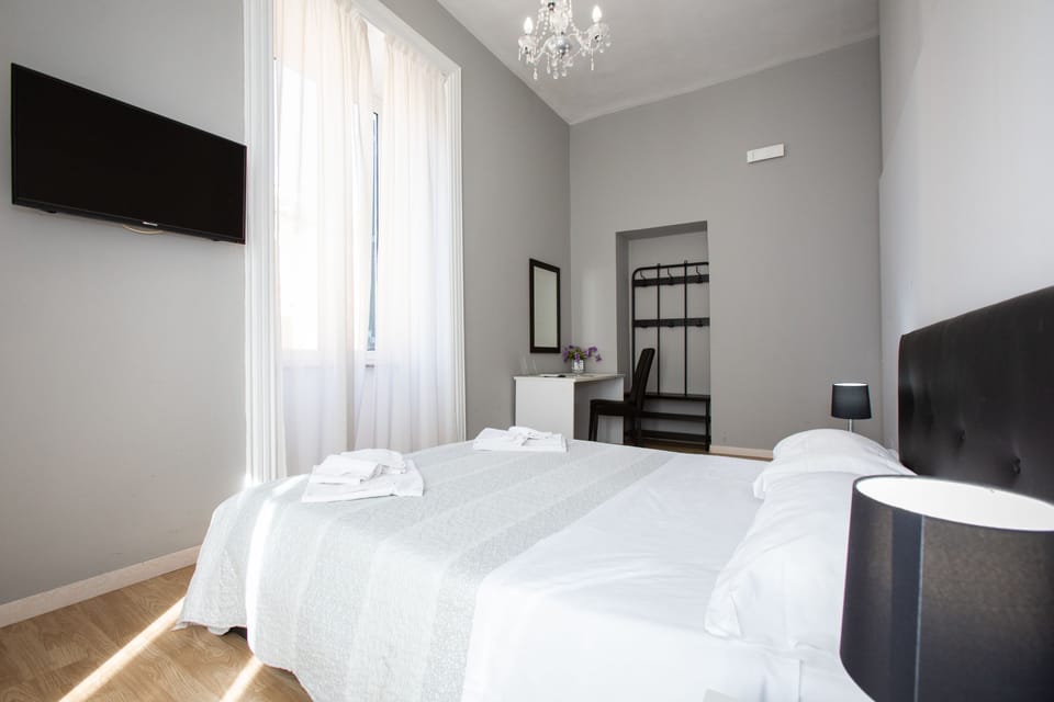 Double or Twin Room | Minibar, desk, soundproofing, iron/ironing board