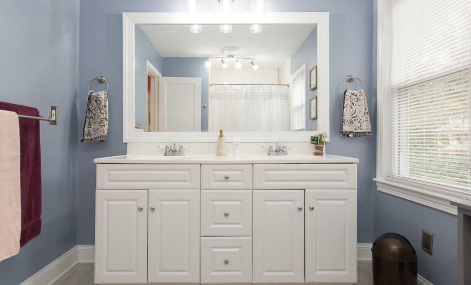 Large bathroom with double vanity. 