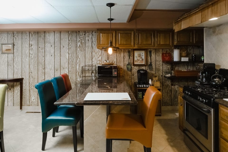 Dining area seating with granite counter tops.