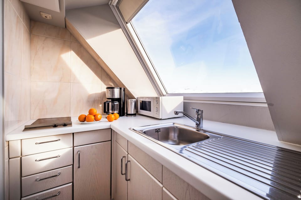 Junior Suite, Sea View, Beachside | Private kitchenette | Fridge, stovetop, coffee/tea maker, electric kettle