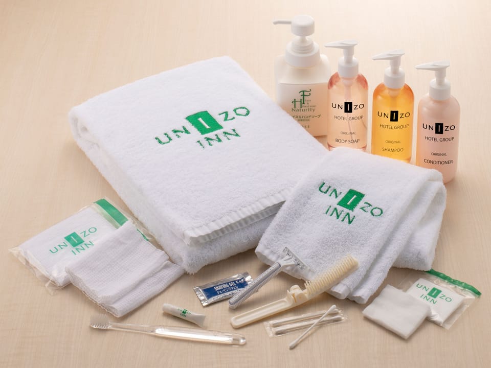 Combined shower/tub, free toiletries, hair dryer, slippers