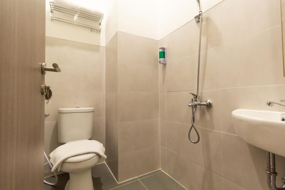 First Class Room | Bathroom | Shower, towels