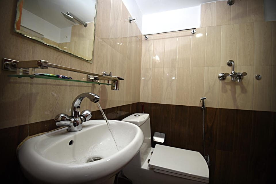 Shower, free toiletries, hair dryer, slippers