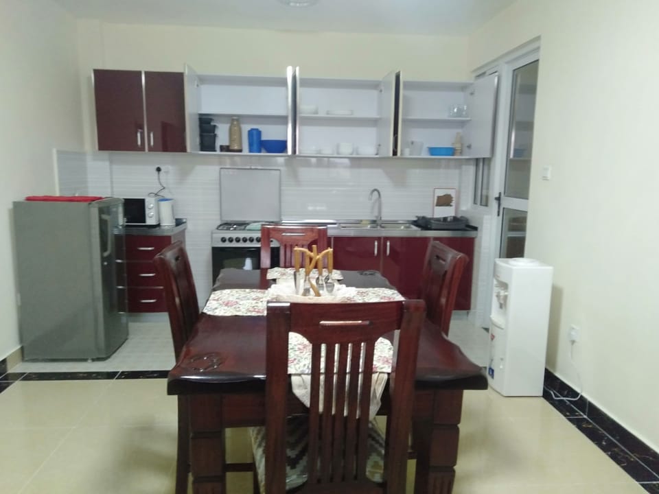 Comfort Apartment | Private kitchen | Full-size fridge, microwave, oven, stovetop