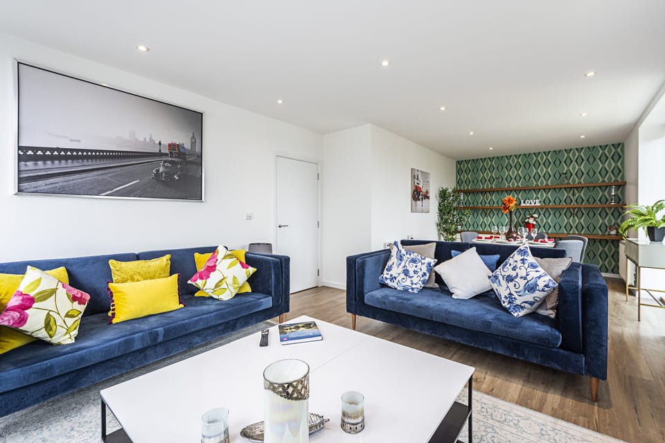 Three-Bedroom Apartment | Living area | 55-inch LED TV with digital channels, TV