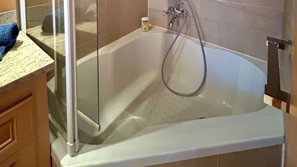 bathtub in private bathroom of the master bedroom 1 