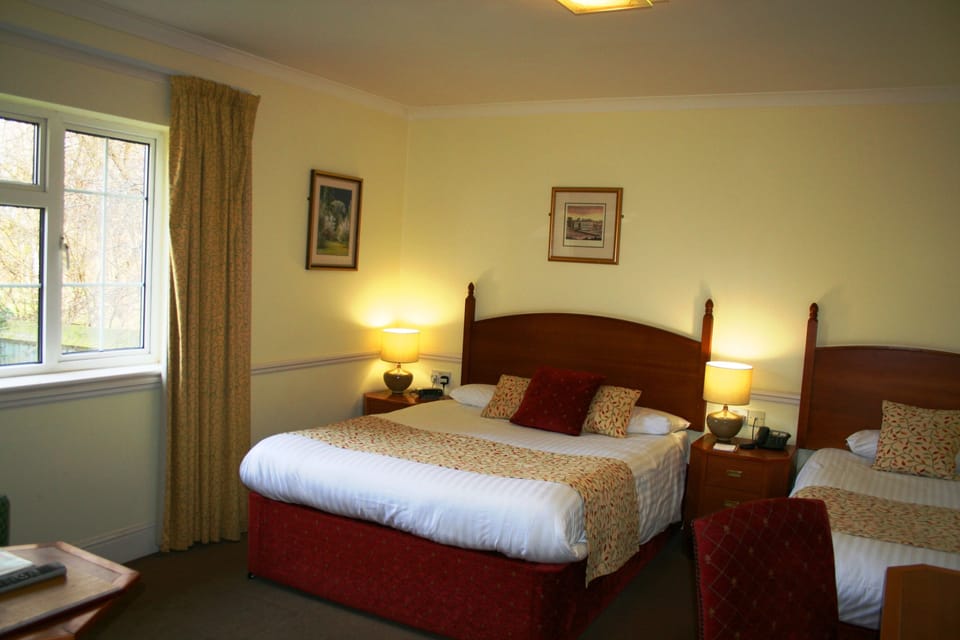 Family Twin Room, Multiple Beds, Courtyard View | Individually decorated, individually furnished, desk, laptop workspace