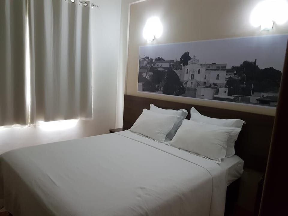Double Room | Minibar, blackout drapes, free WiFi, bed sheets