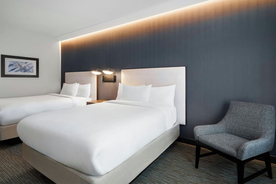 Standard Room, 2 Queen Beds | In-room safe, desk, laptop workspace, blackout drapes