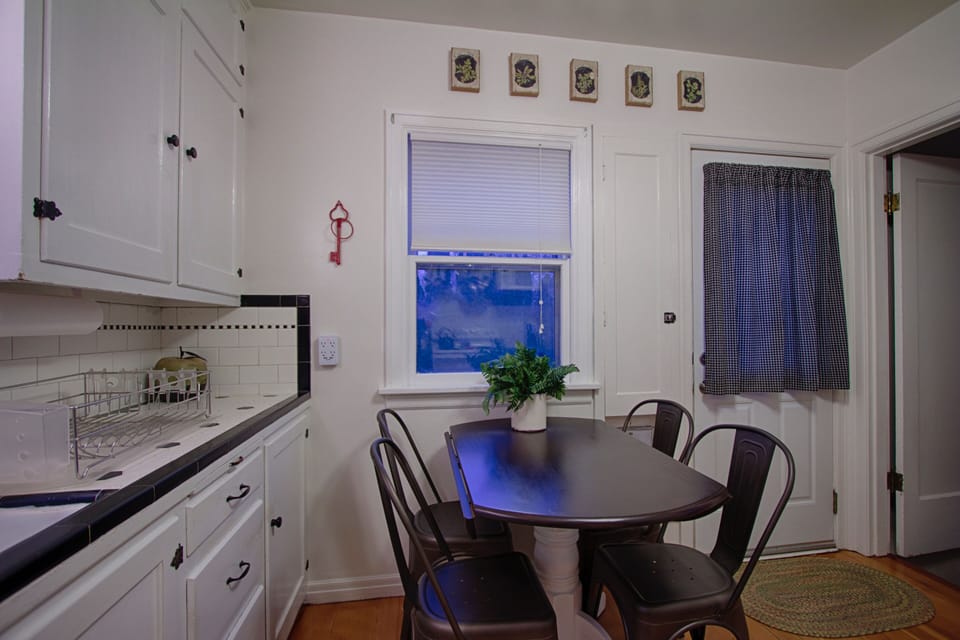 Kitchen, back door, stairs to downstairs