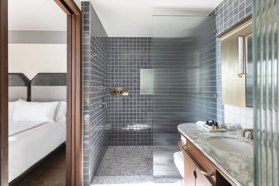 Room, 1 King Bed | Bathroom | Shower, designer toiletries, hair dryer, bathrobes