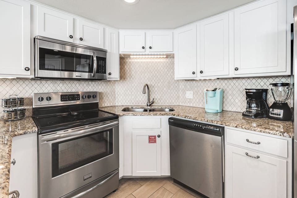 Well stocked kitchen with new appliances.