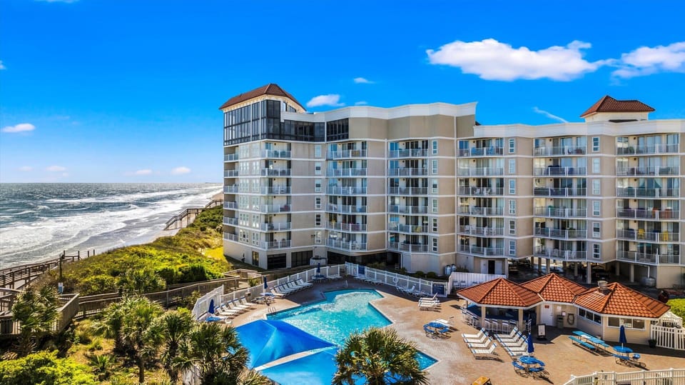 Charming beachfront condo with resort-style amenities.