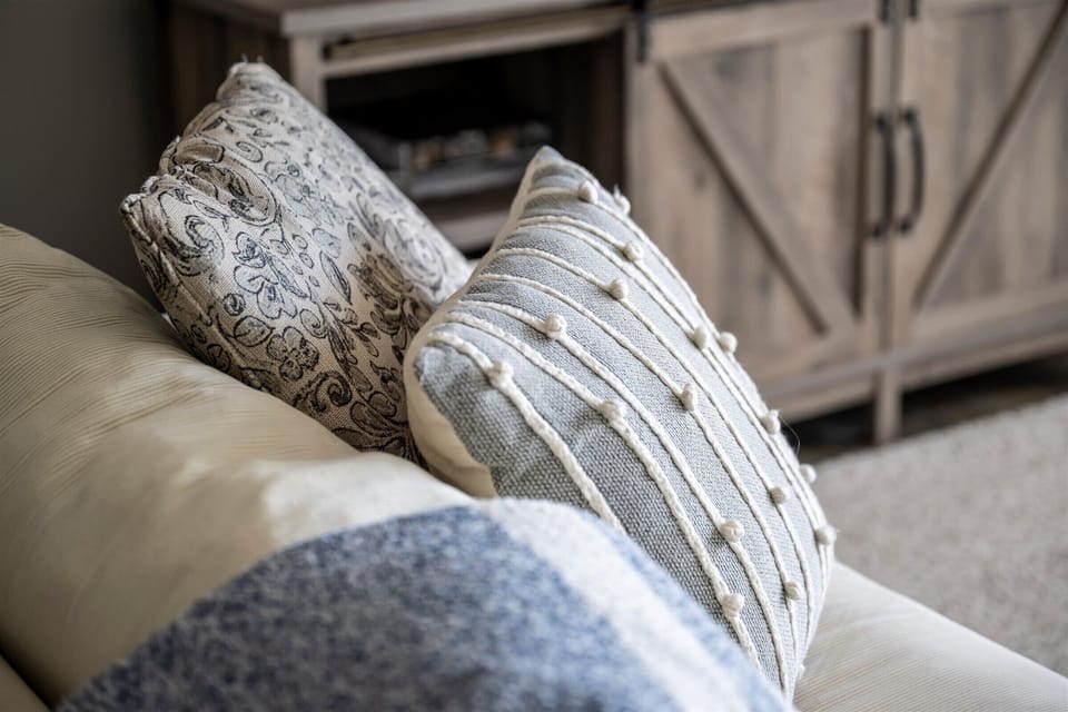 Cozy Touches plush pillows, warm throws, and a space that feels just like home.