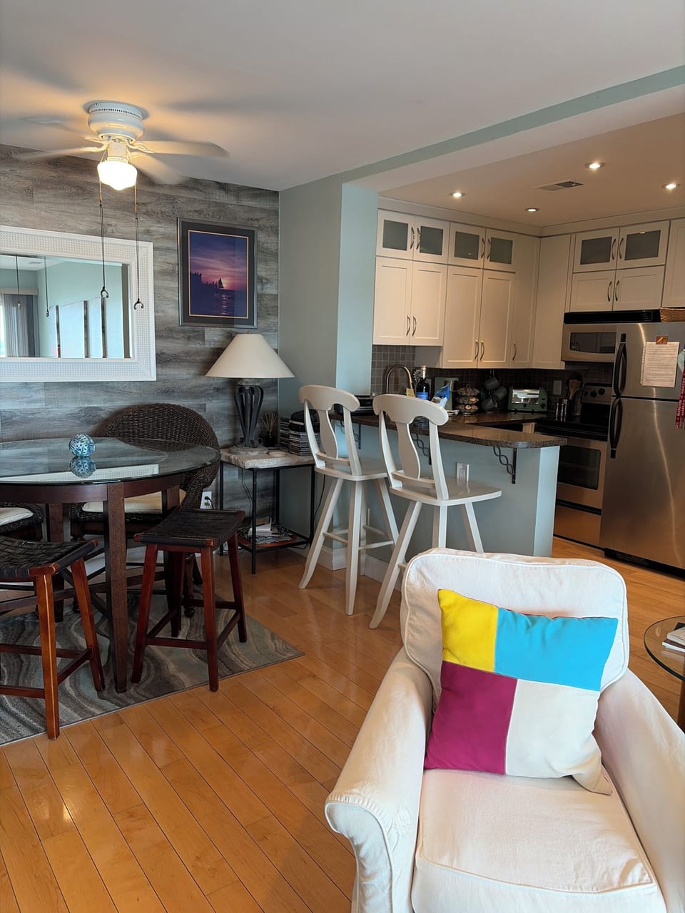 Open concept living room, dining area and kitchen.