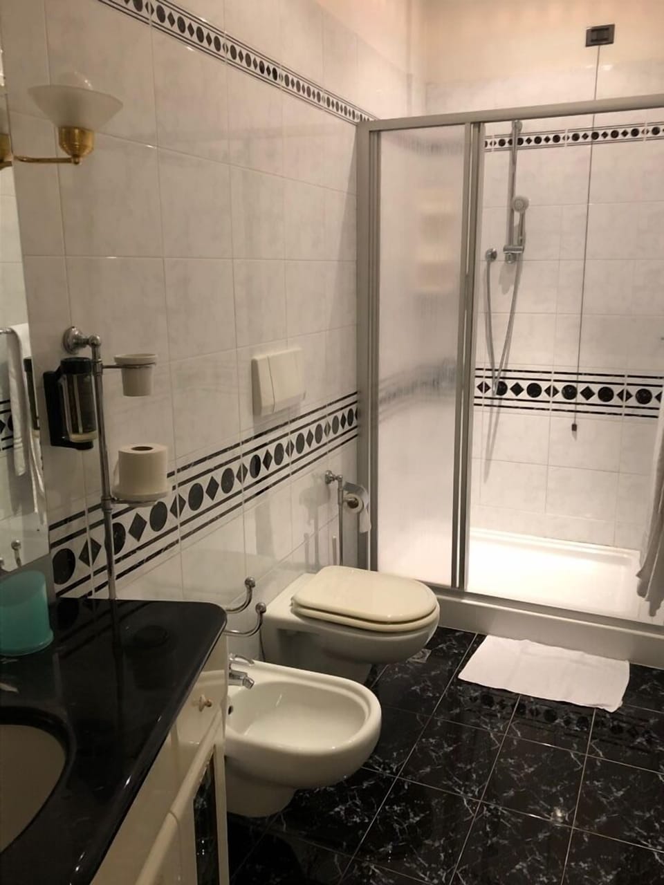 Shower, free toiletries, hair dryer, slippers