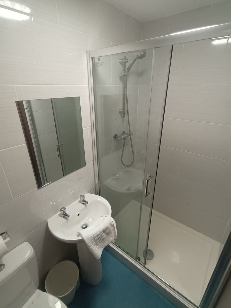 Shower, free toiletries, towels, soap