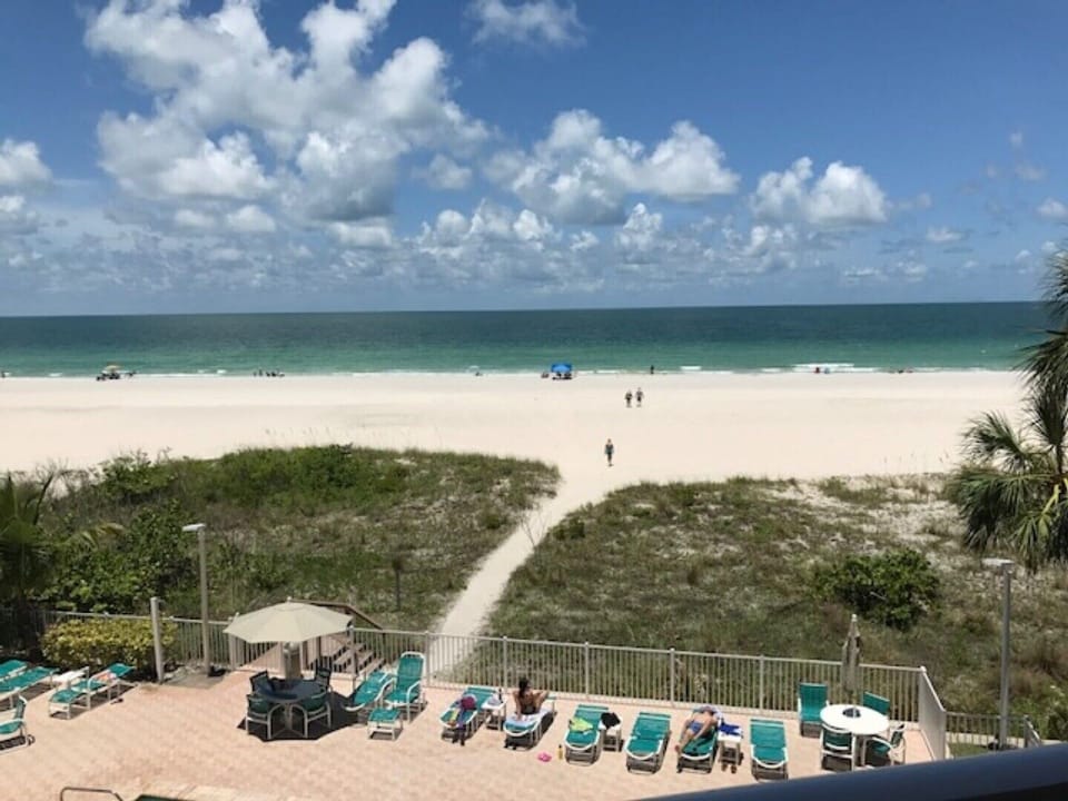 Walkway to the sandy beach & clear Gulf water