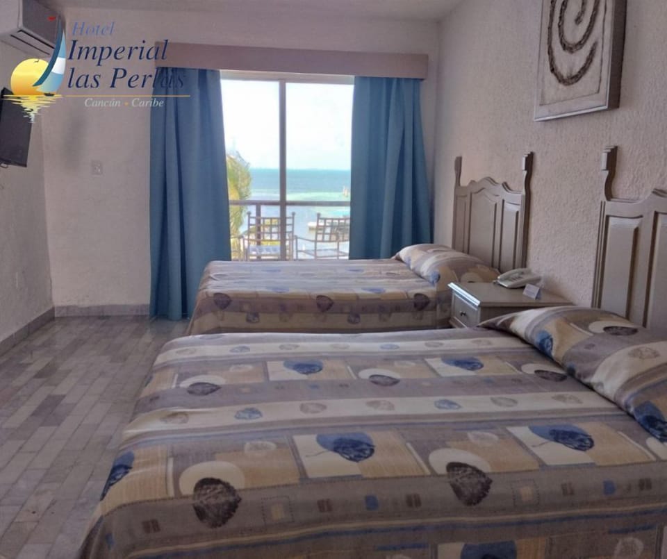 Standard Double Room | Iron/ironing board, bed sheets