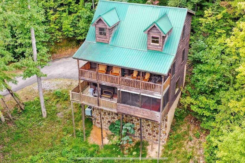Aerial shot of Bears Hideaway atop private driveway exclusive elite hilltop view