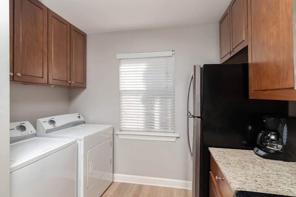 Includes laundry area.