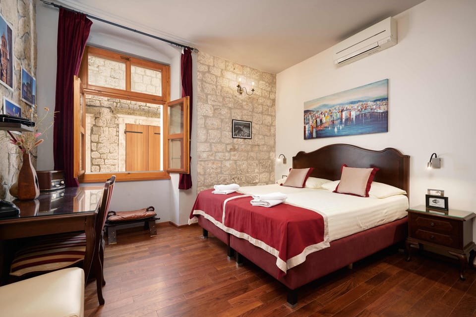 Down comforters, minibar, in-room safe, desk