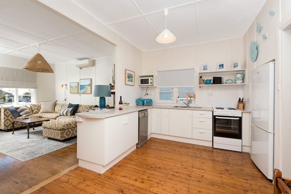 Kitchen to lounge open living plan
