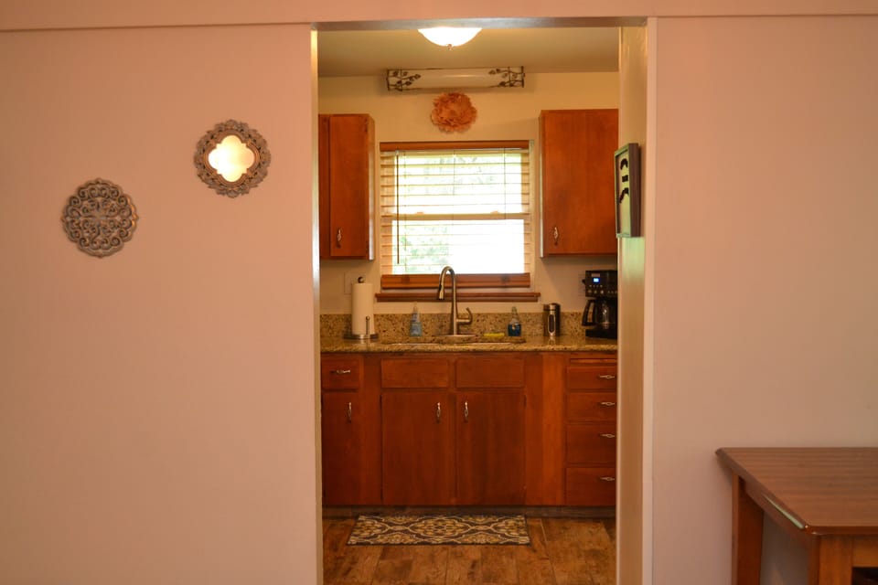 View of kitchen from living room area. 
