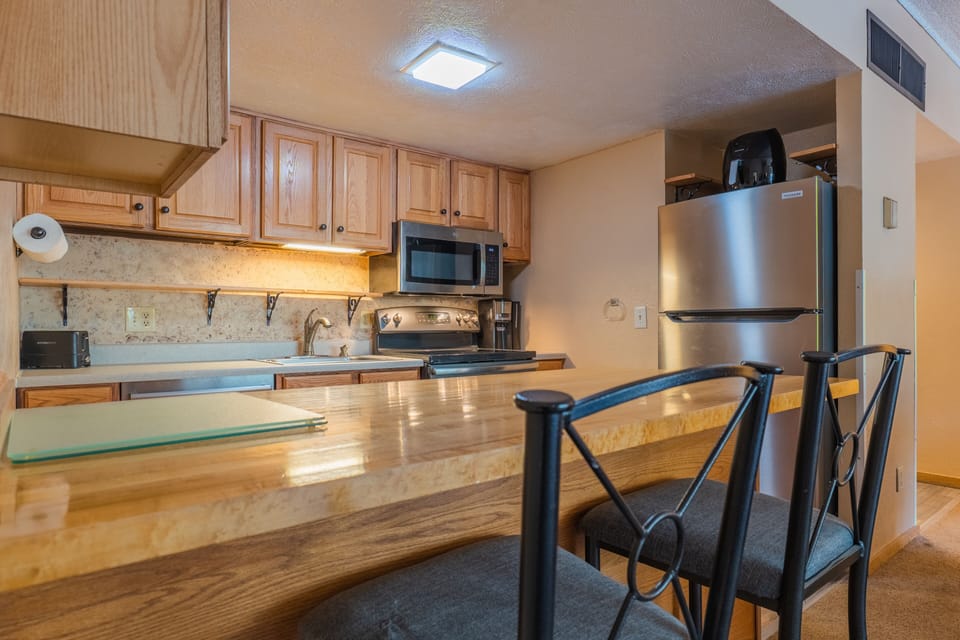 Condo, 2 Bedrooms | Private kitchen | Fridge, microwave, oven, dishwasher