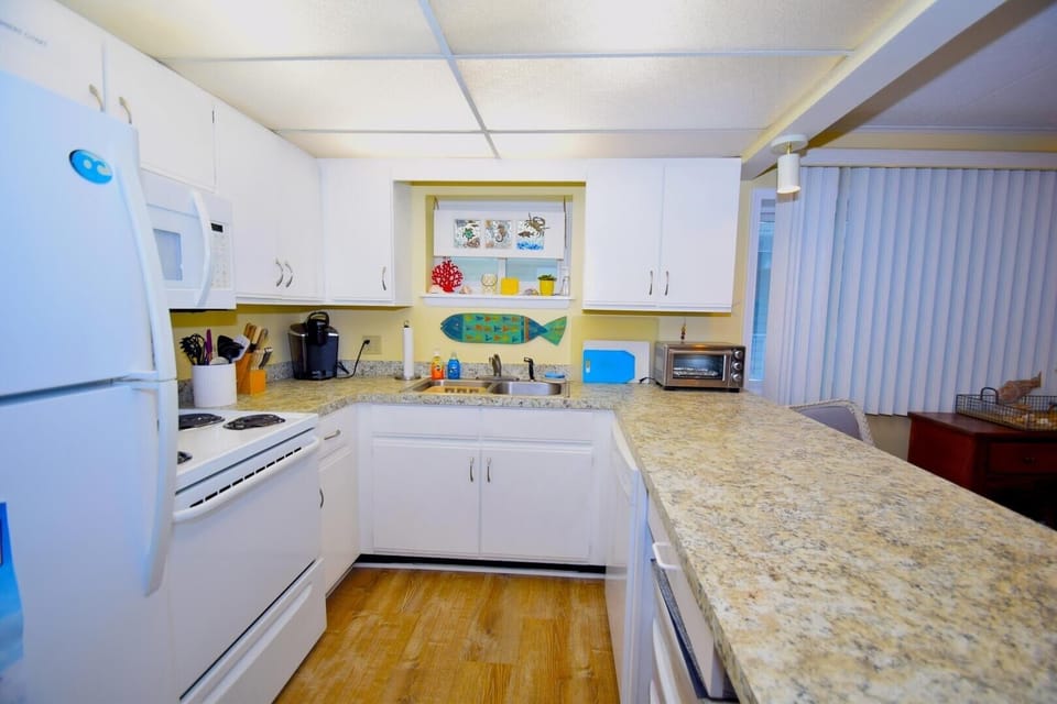 Condo, 2 Bedrooms | Private kitchen | Fridge, coffee/tea maker, toaster