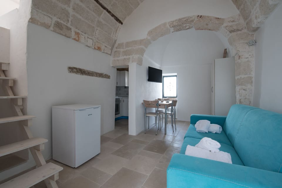 Studio, Non Smoking | Living area | Flat-screen TV