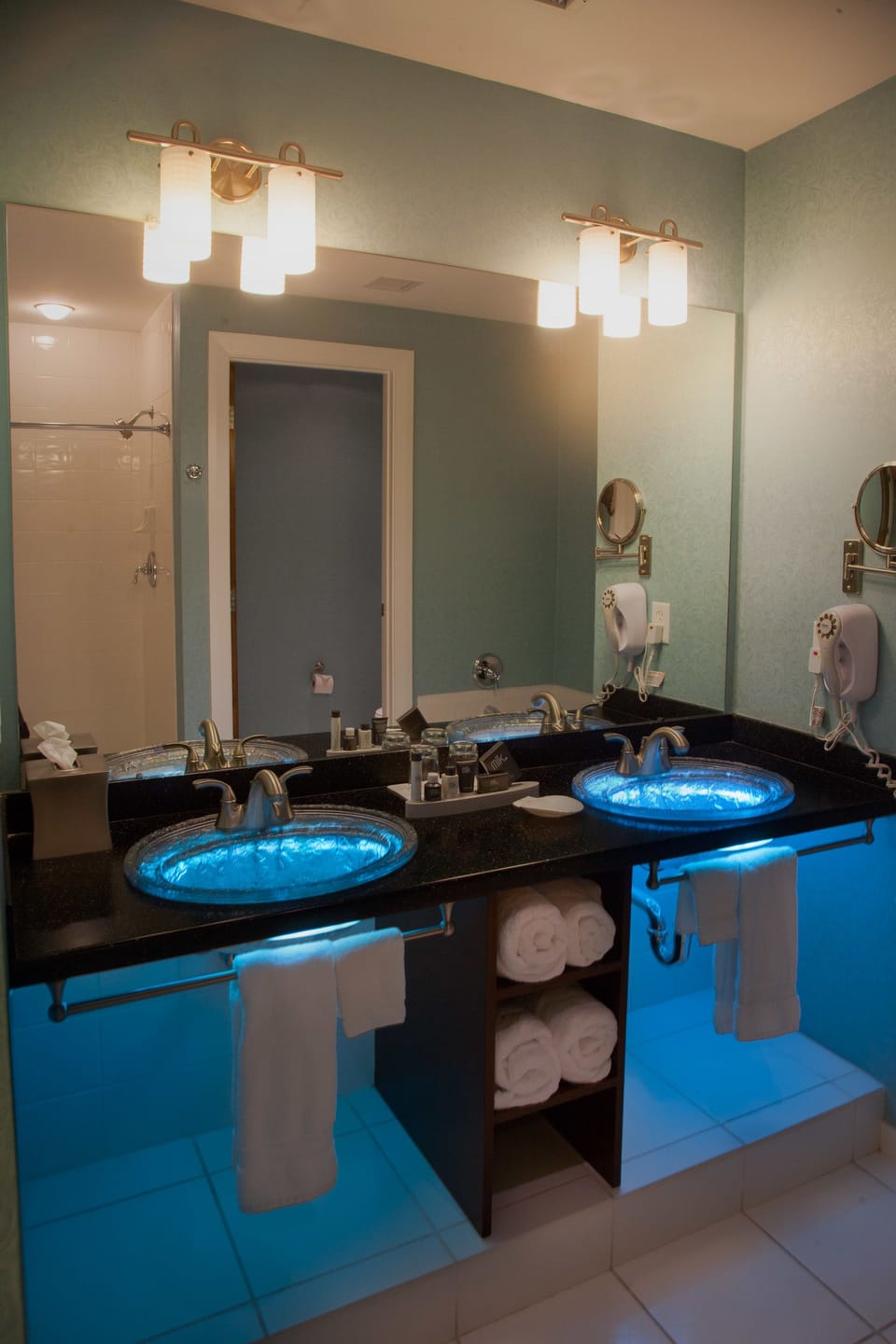 Designer toiletries, hair dryer, bathrobes, towels