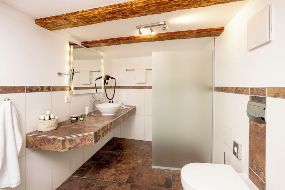 Standard Double Room | Bathroom | Shower, hair dryer, bathrobes, towels