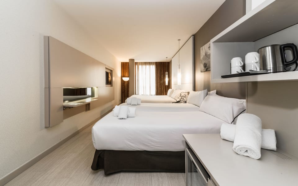 Premium bedding, down comforters, memory foam beds, minibar
