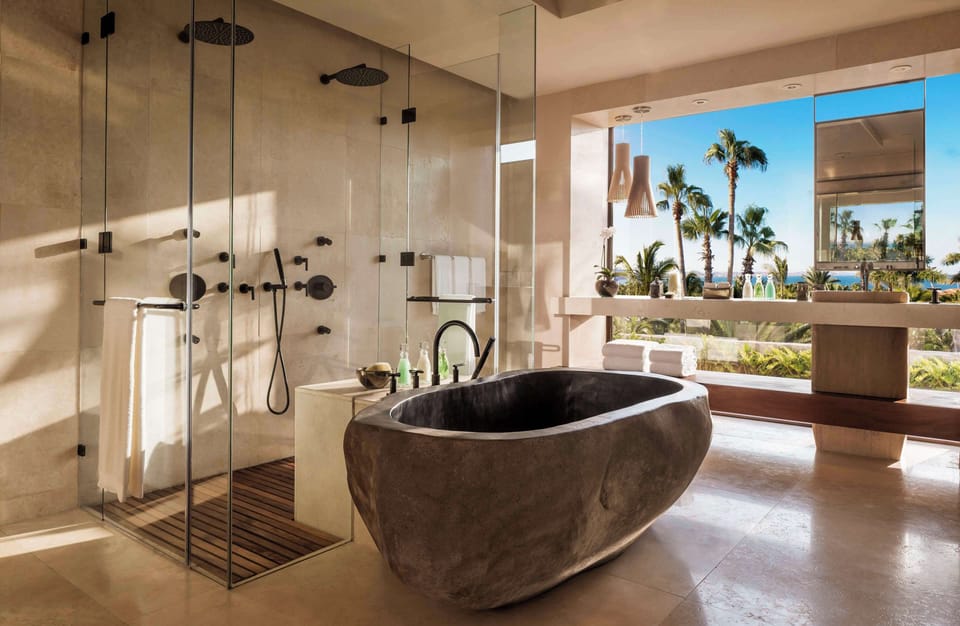 Villa (One) | Bathroom | Combined shower/tub, rainfall showerhead, designer toiletries
