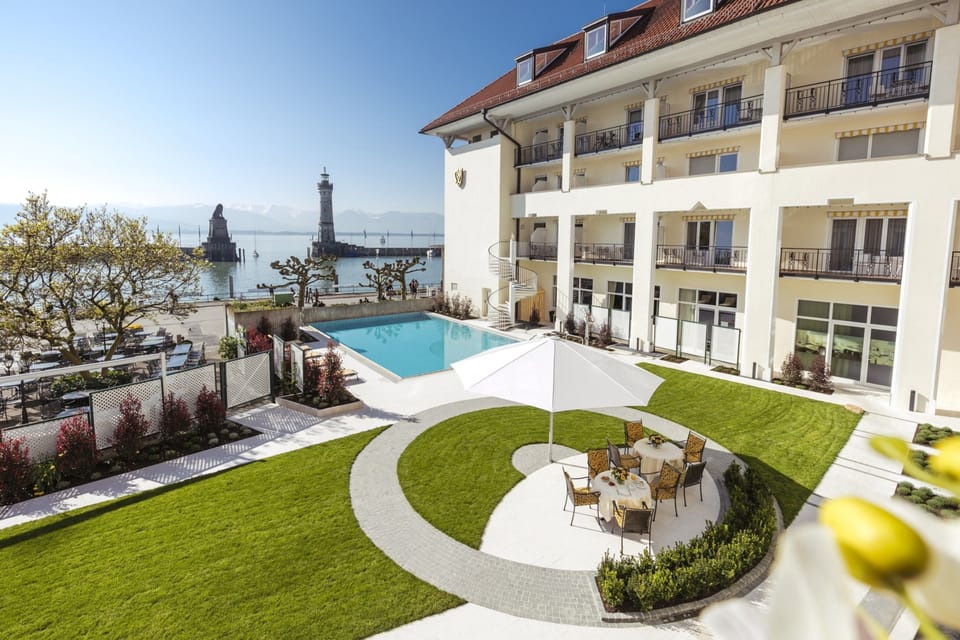 Indoor pool, seasonal outdoor pool, pool umbrellas, sun loungers