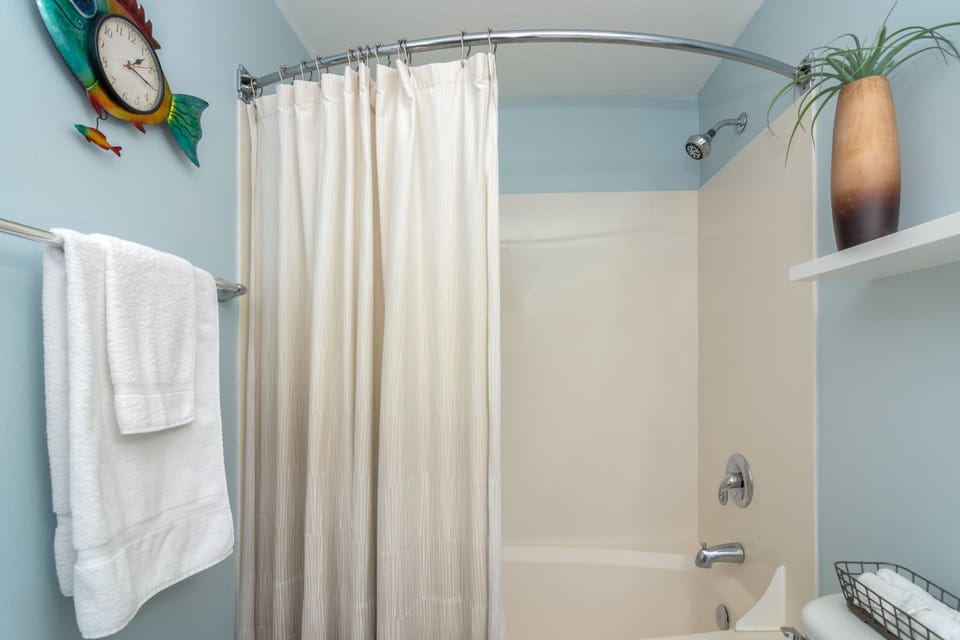 Second bath has updated paint and decor.